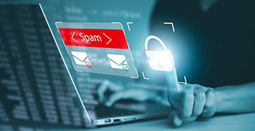 An email security concept image with a person touching a digital padlock next to a Spam warning box.