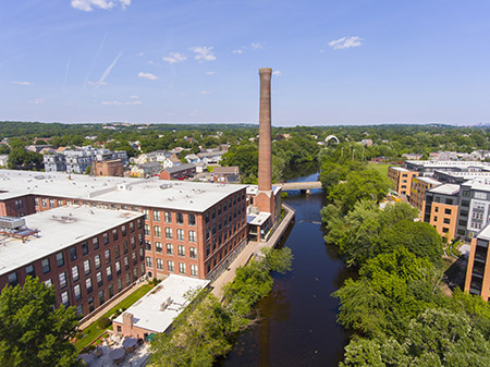 Waltham, MA, the historic city center with a river.